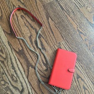 Kate spade iPhone 13 Pro Max case. The case does remove from the crossbody